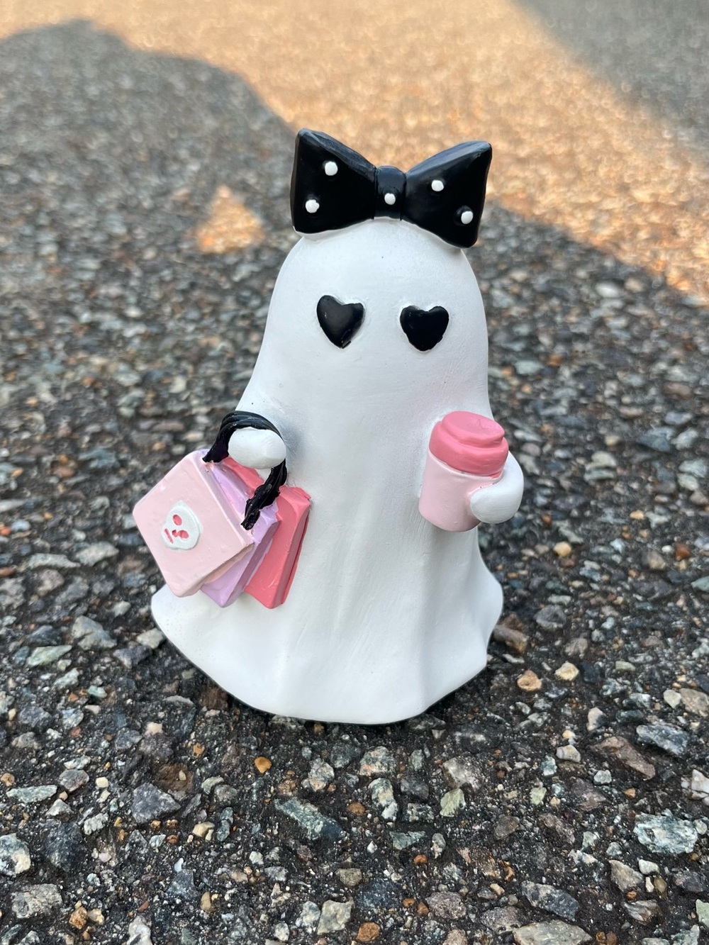 Chic Ghost Figurine with Pink Accessories
